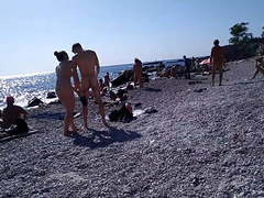 Young couple on the nude beach