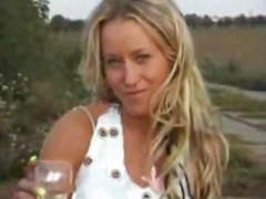 Blond slag pissing outside 2 with piss drink